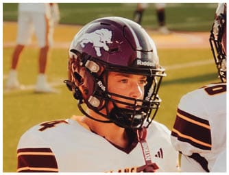 A group of football players on a field. Description generated by AI