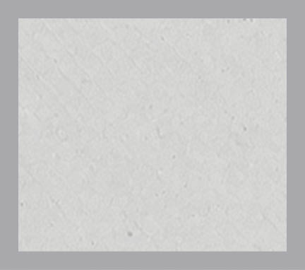 A white wall with a gray border. Description generated by AI