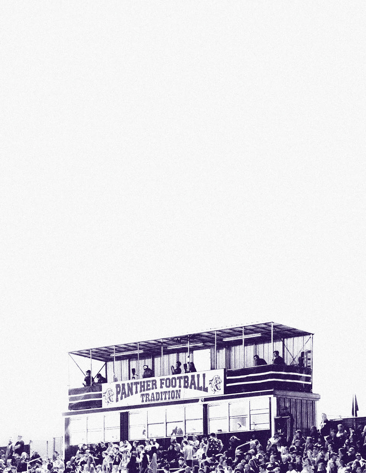 A crowd of people is gathered in front of a two-story structure with a sign that reads “Panther Football Tradition" at an outdoor event. Description generated by AI