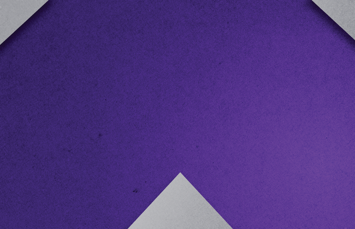 A purple triangle on a gray background. Description generated by AI