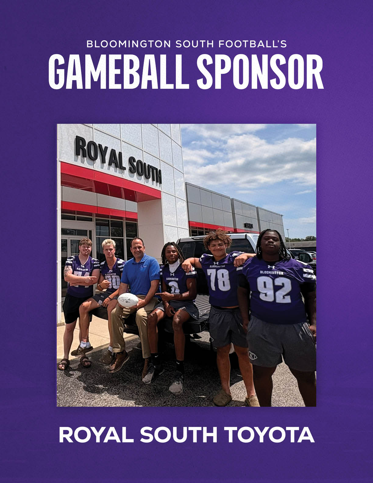 A group of people wearing football jerseys and casual clothing pose outside a building with a sign reading Royal South under a banner announcing Royal South Toyota as the Bloomington South Football gameball sponsor. Description generated by AI
