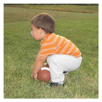 A football player wearing a blue and red jersey. Description generated by AI