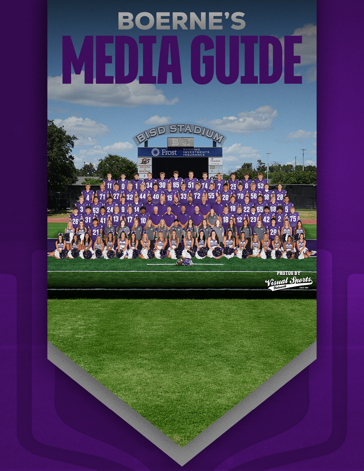 A large group of people wearing matching purple sports uniforms and cheerleading outfits pose together on a football field in front of a scoreboard under a blue sky with clouds. Description generated by AI