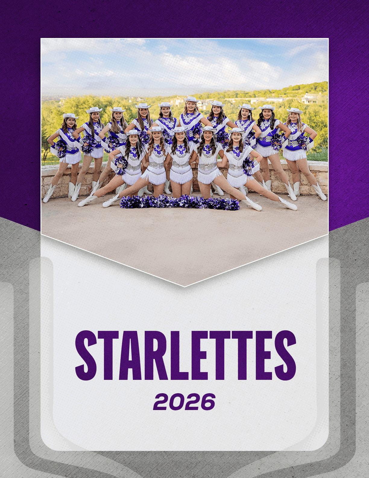 A group of people dressed in matching white and purple dance uniforms pose outdoors in two rows with pom-poms in front and the text “STARLETTES 2026" below them. Description generated by AI