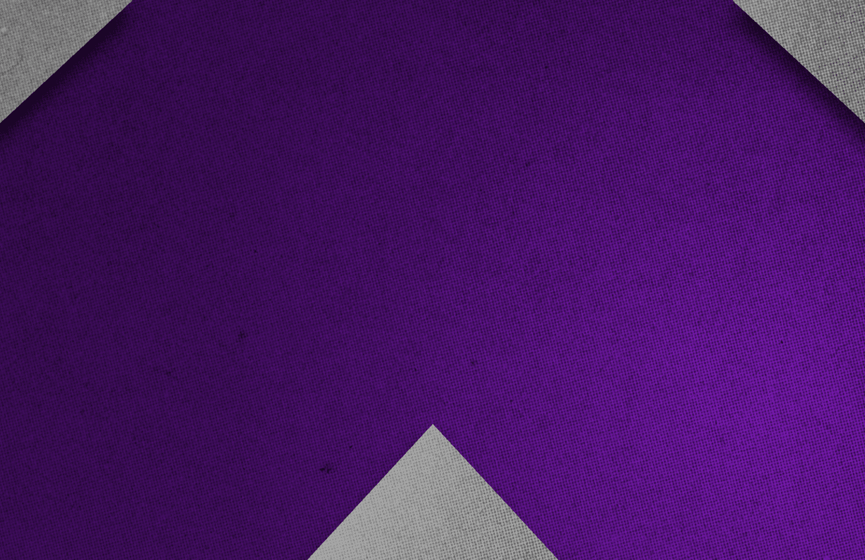 A close-up of a textured fabric with a purple chevron pattern bordered by gray fabric. Description generated by AI