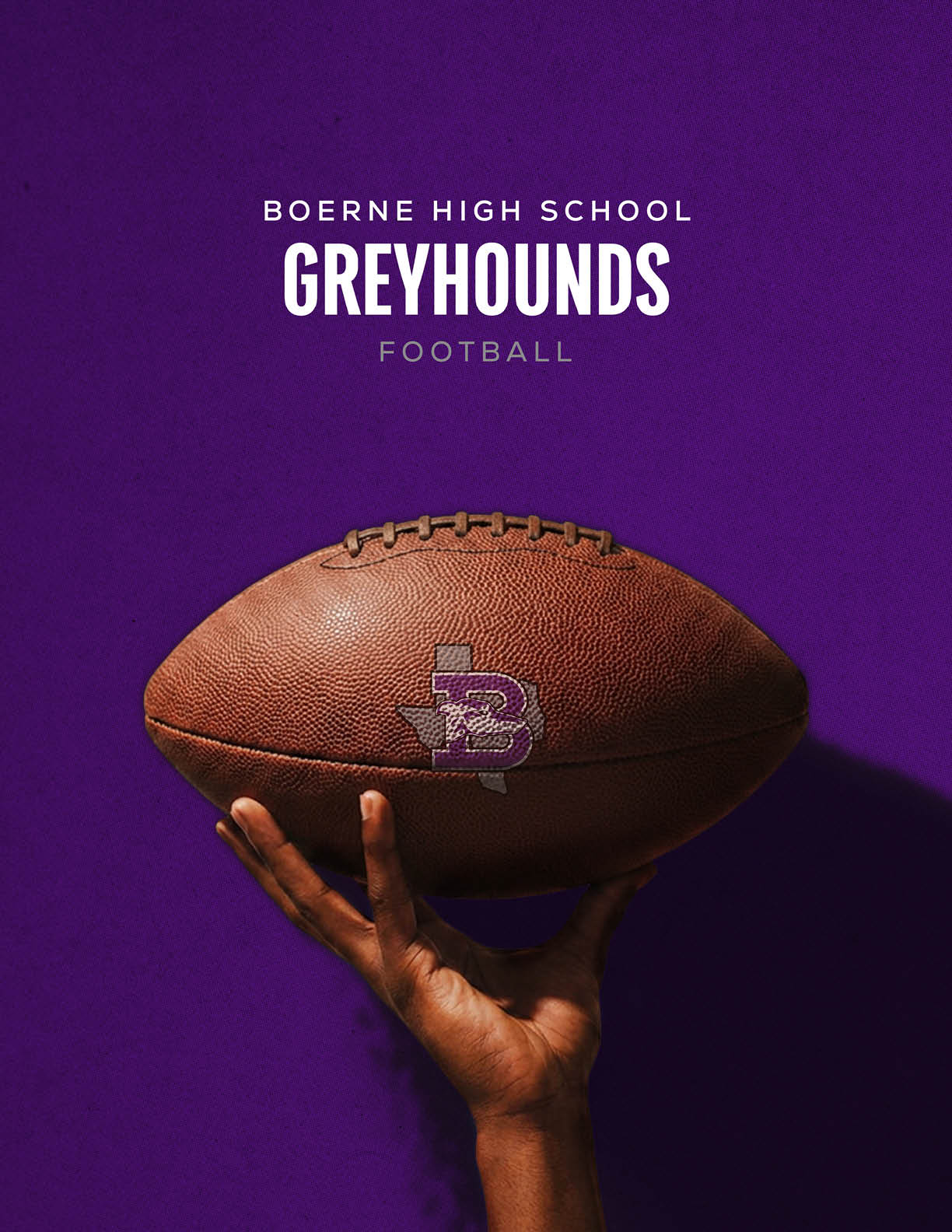Several people wearing football helmets and uniforms are engaged in a close physical play on a purple background with large black text partially visible behind them. Description generated by AI