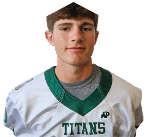 Person with short curly hair wearing a white sports jersey with green trim and the word “TITANS" on the front. Description generated by AI