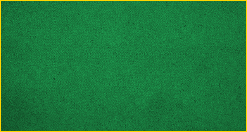 A close-up view of a green textured surface with small black specks scattered throughout. Description generated by AI
