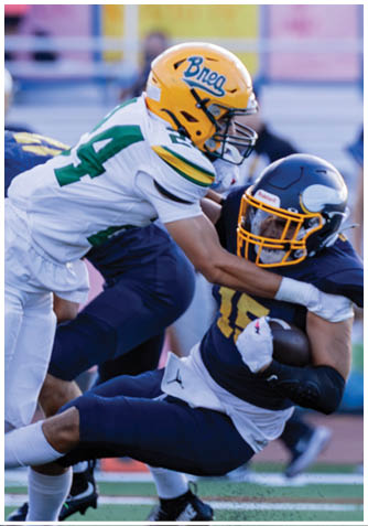 A football player wearing a blue jersey with the number 58 on it. Description generated by AI