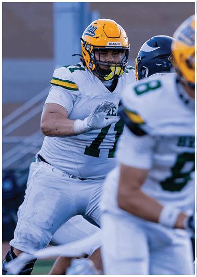 A football player wearing a blue jersey with the number 58 on it. Description generated by AI