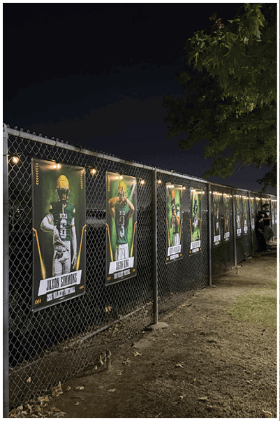 A football game is being played on a field. Description generated by AI