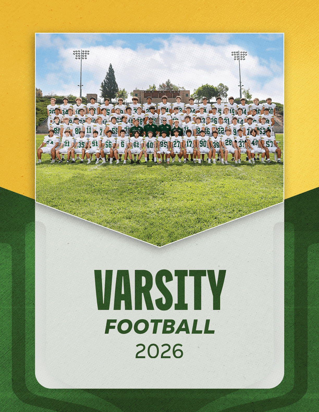 A group of football players sitting on a bench. Description generated by AI