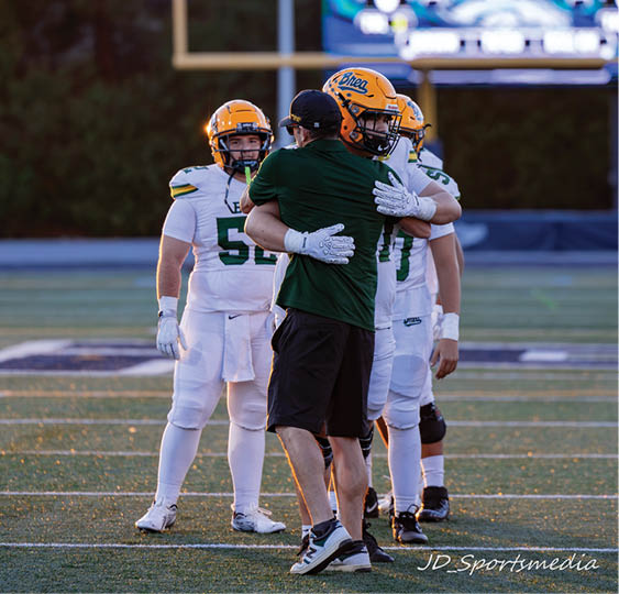 A group of football players celebrating a victory. AI generated content