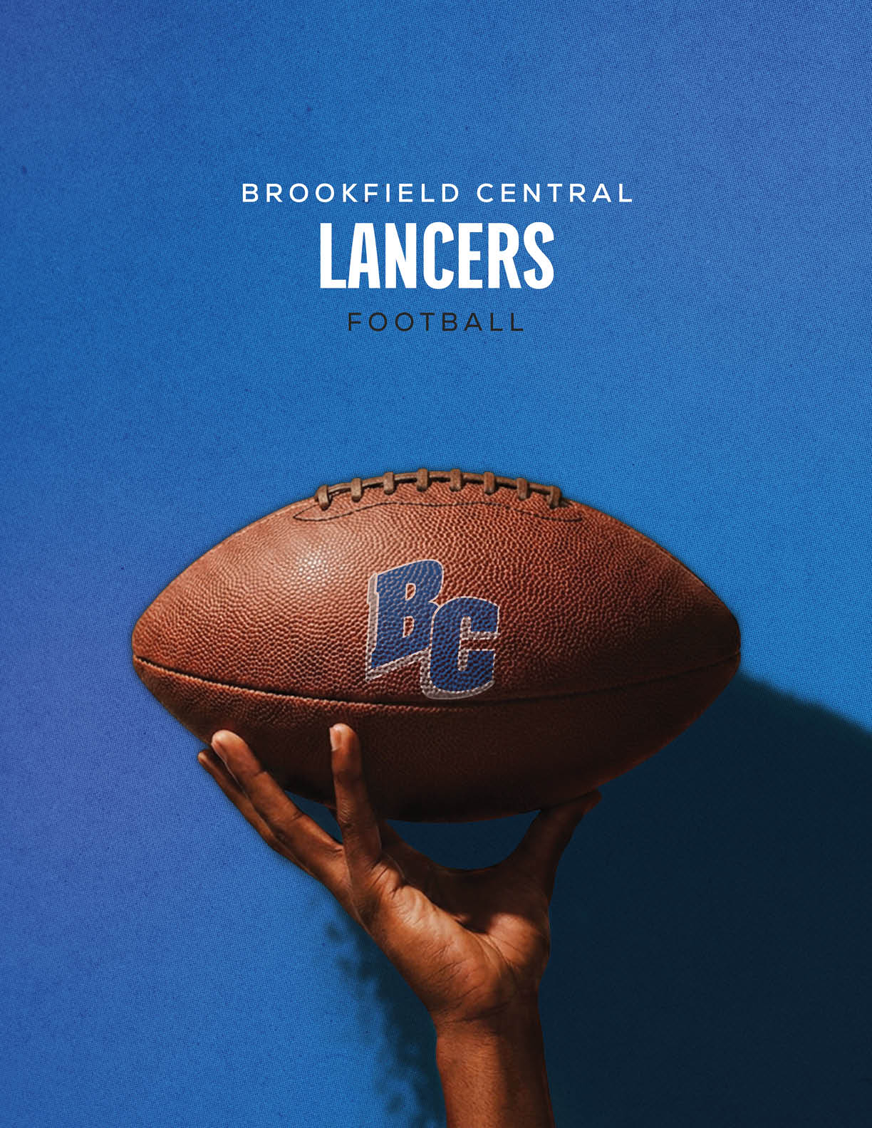 A hand is holding a football with a cardinal logo against a red background with the text Sun Prairie East Cardinals Football above. Description generated by AI