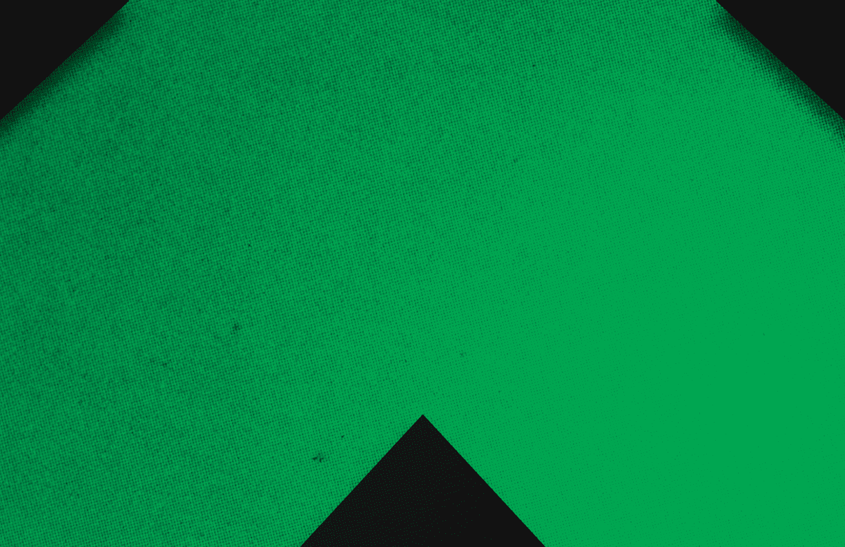 A red and black triangle. Description generated by AI