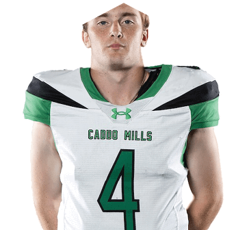 A person stands facing forward wearing a white and green sports jersey with the number 4 and green athletic pants against a white background. Descripci n generada con IA