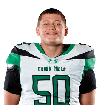A person wearing a green and white football uniform with the number 50 stands smiling with hands behind their back against a white background. Descripci n generada con IA