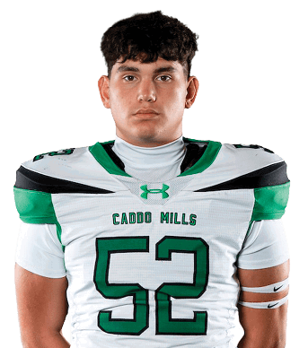 A person stands facing forward wearing a white and green football uniform with the number 52 and the words “Cajon Hills" on the jersey. Descripci n generada con IA