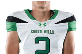 A person wearing a white and green football jersey with the number 2 and the text “Caddo Mills" on the front. Descripci n generada con IA
