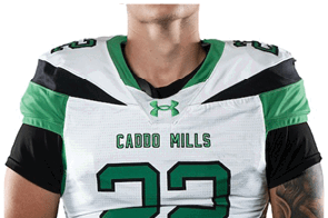 A person wearing a white and green football jersey with the number 22 and the words “Caddo Mills" on the front. Descripci n generada con IA