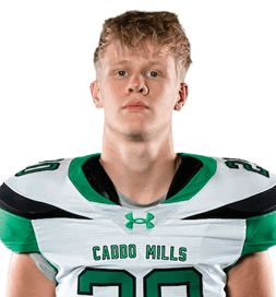 A person stands facing forward wearing a white and green football uniform with the number 20 and the words “Lloyd Hill" on the jersey. Descripci n generada con IA