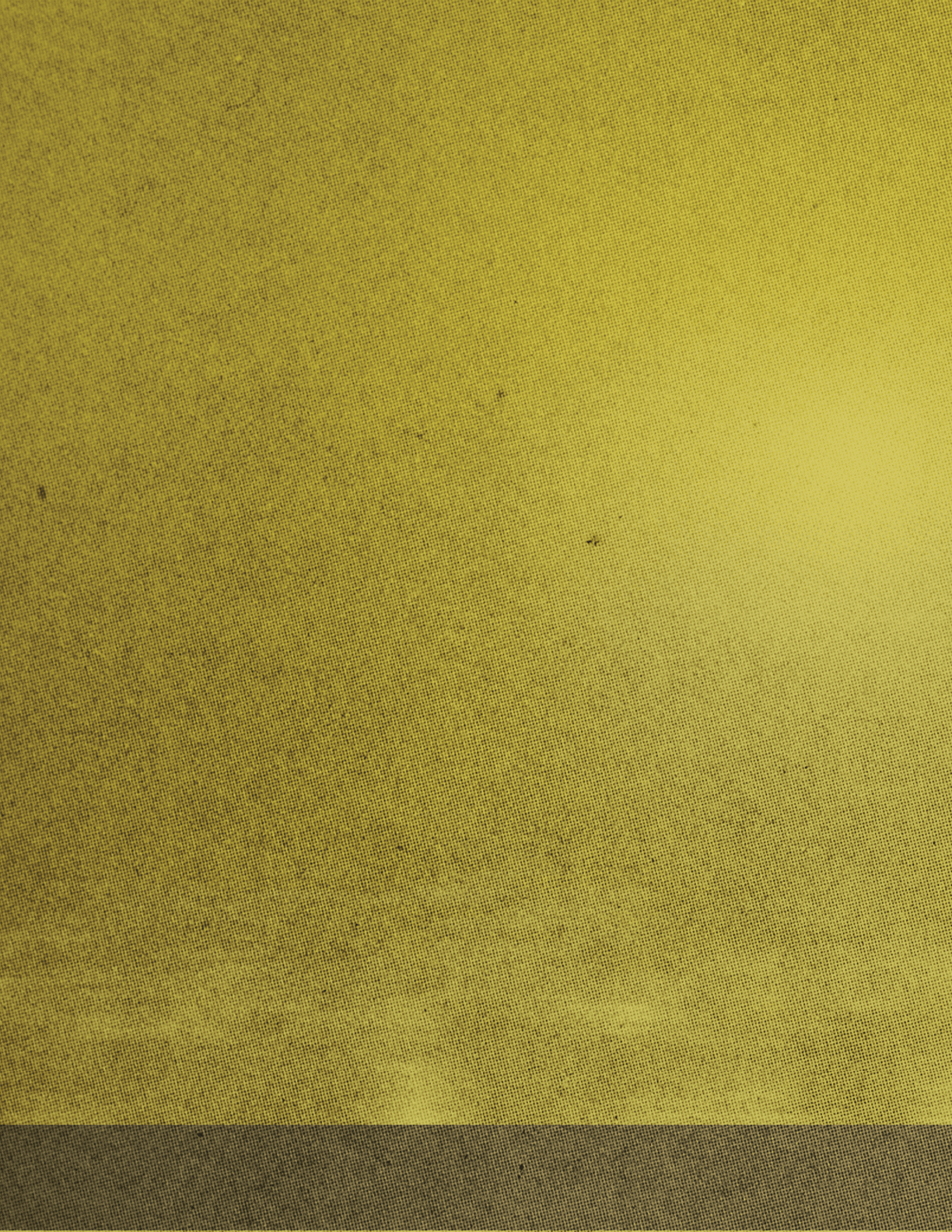 A yellowish-brown sky with a few clouds. Description generated by AI