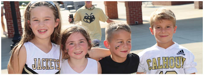 A football player wearing a blue and white uniform. Description generated by AI