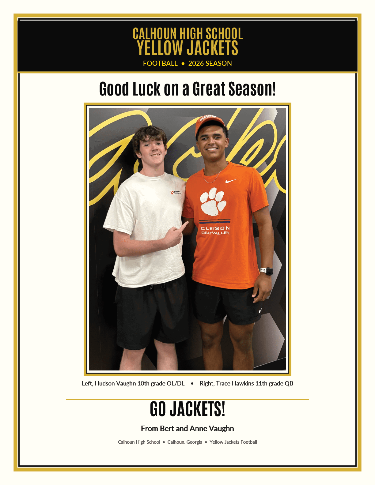 Two adults stand side by side smiling with one wearing a white shirt and black shorts and the other wearing an orange Clemson football shirt and black shorts in a framed poster wishing good luck for the Calhoun High School Yellow Jackets football 2026 season. Description generated by AI