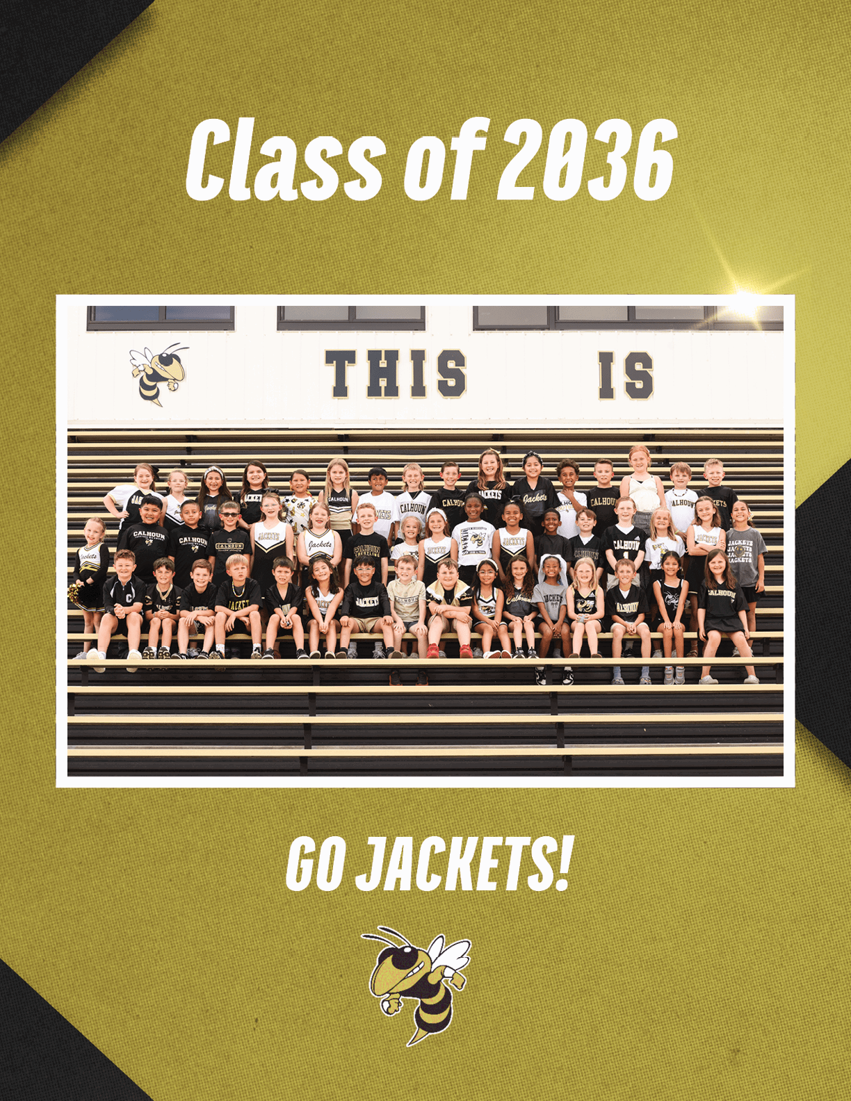 A group of children wearing black and white sportswear are seated on bleachers in a gymnasium with the words “THIS IS" on the wall behind them, accompanied by a yellow jacket mascot and the text "Class of 2036" and "GO JACKETS!" above and below the photo. Description generated by AI