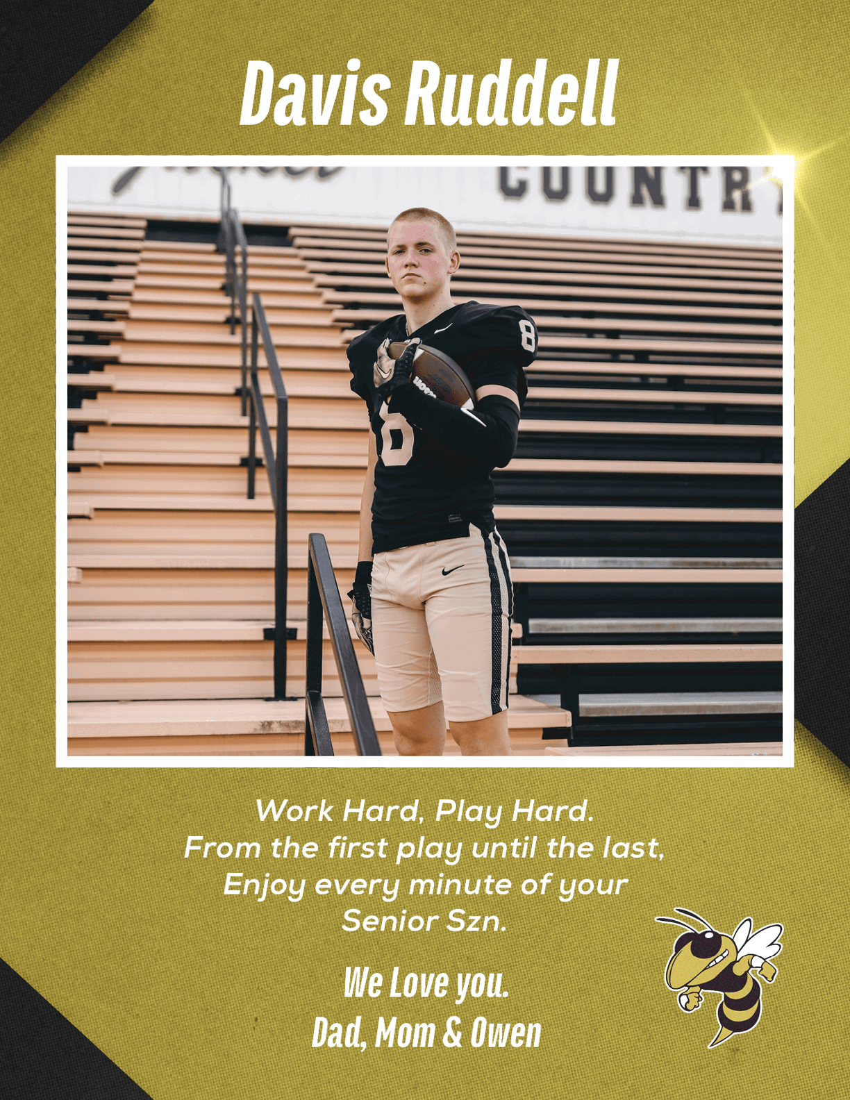 A person in a black football jersey and beige pants stands on stadium bleachers holding a football with a motivational message and a cartoon hornet graphic on a gold and black background. Description generated by AI