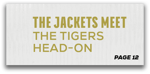 page 12,The Jackets Meet the Tigers Head O