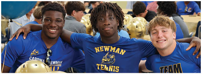 A football player wearing a blue and white uniform. Description generated by AI