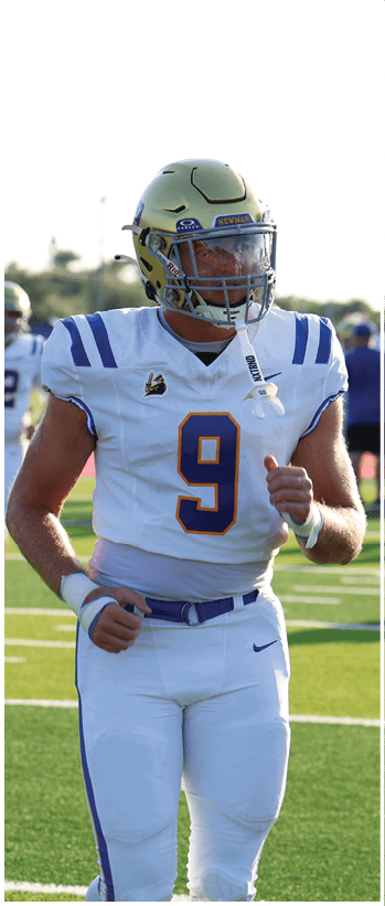A football player running on the field. Description generated by AI