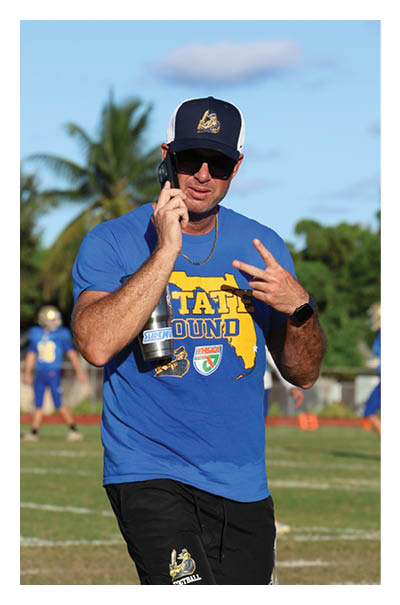 A young man wearing a football jersey with the name Vista on the back. AI generated content