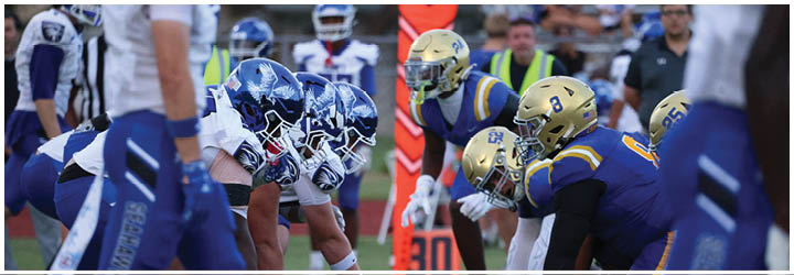 A group of football players on a field. Description generated by AI