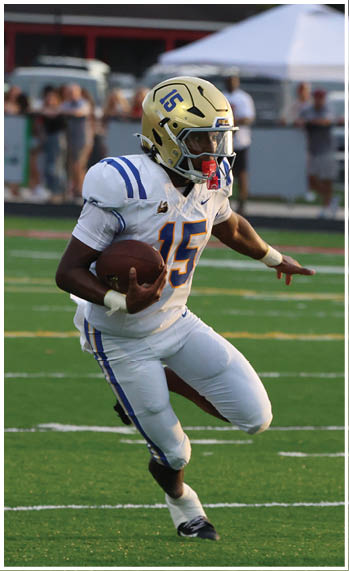 A football player running on the field. Description generated by AI