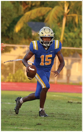 A football player running on the field. Description generated by AI