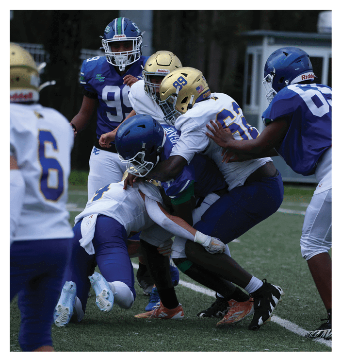 A group of football players walking on the field. AI generated content