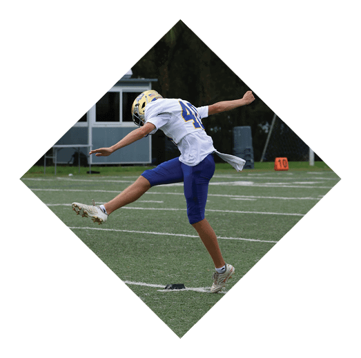 A football player wearing a black jersey with the number 16 on it is holding a football. AI generated content