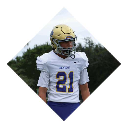 A female football player is kicking a football on a field. AI generated content