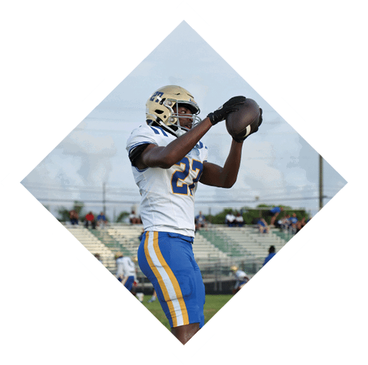 A football player wearing a black jersey with the number 16 on it is holding a football. AI generated content