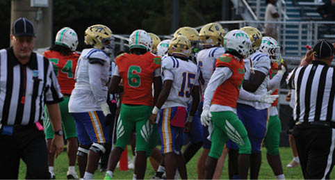 Two men wearing football uniforms are hugging each other on a field. AI generated content