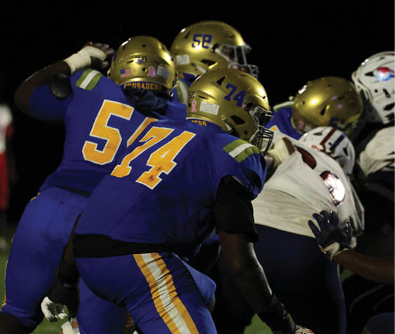A group of football players celebrating a victory. AI generated content