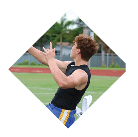 A football player wearing a black jersey with the number 3 kneels on the field. AI generated content