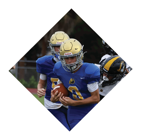 A football player wearing a black jersey with the number 3 kneels on the field. AI generated content
