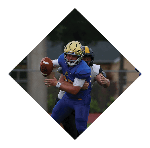 A football player wearing a black jersey with the number 16 on it is holding a football. AI generated content