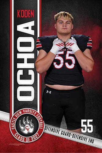 A person wearing a black football uniform with the number 55 stands with hands clasped near the chest against a background featuring the name Ochoa, the word Koden, and a Castle View Varsity Football logo. Description generated by AI