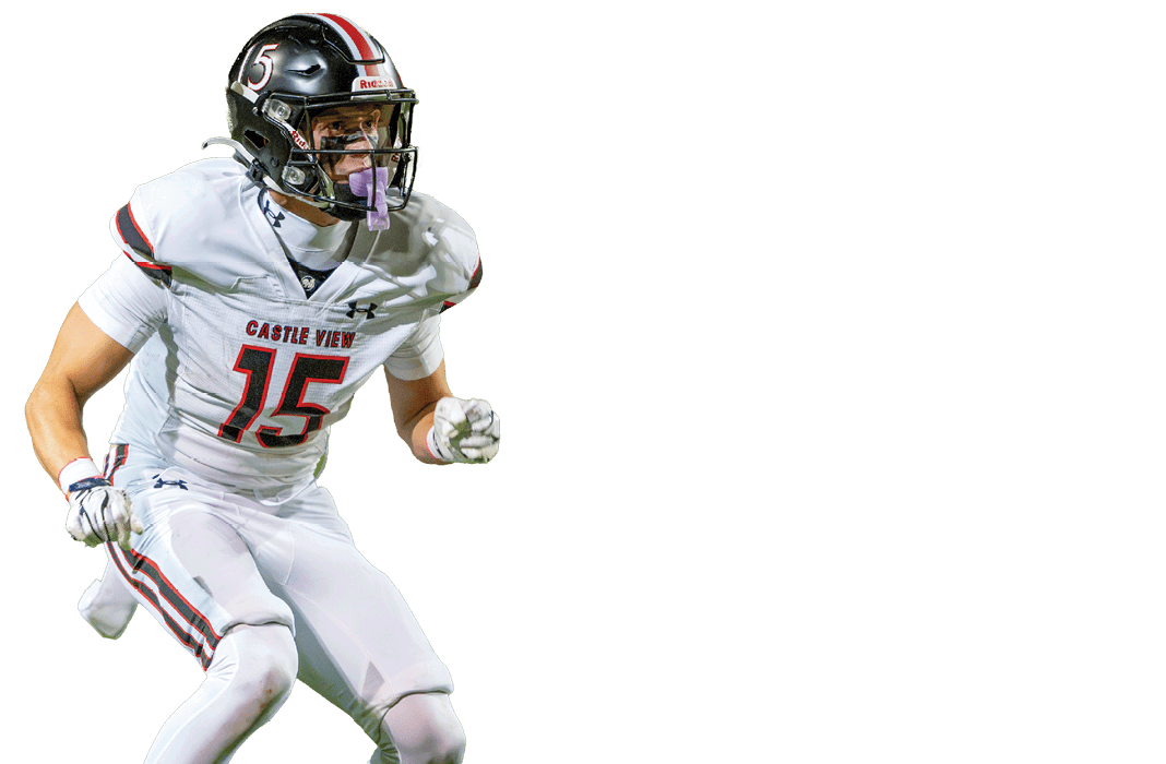 A person wearing a Castle View football uniform with the number 15 is in a dynamic stance, appearing ready to move or react during a game. Description generated by AI