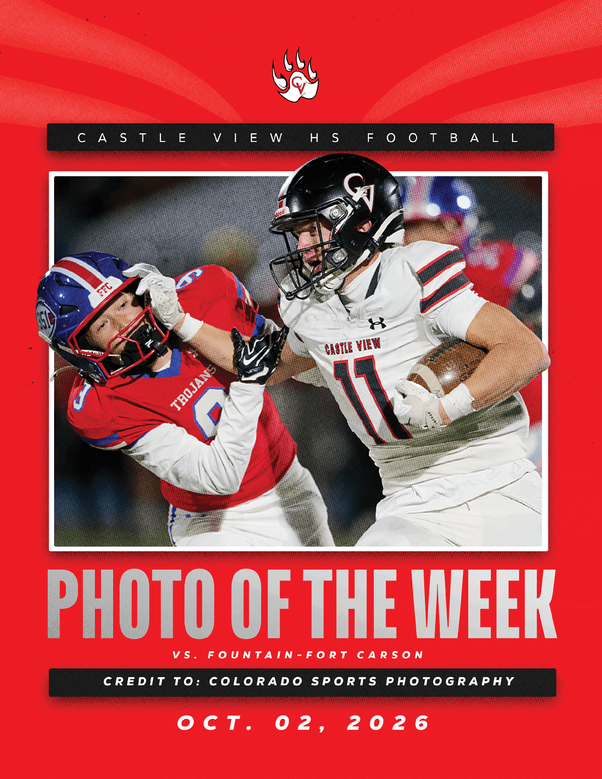 Two football players from opposing teams are engaged in a play with one player in a white uniform holding the ball and the other in a red uniform attempting to block or tackle. Description generated by AI