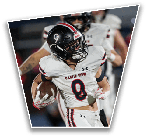 A person wearing a Castle View football uniform with the number 9 is running with a football while other players are visible in the background. Description generated by AI